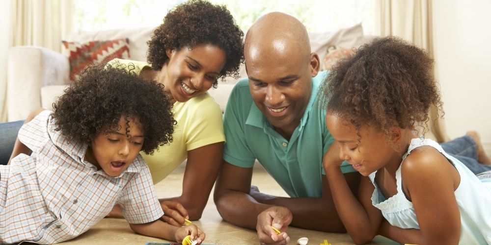 A family playing a board game together.